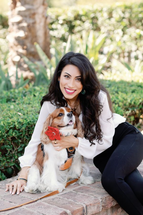 Portrait of Dr. Mana Naeim and her beloved dog
